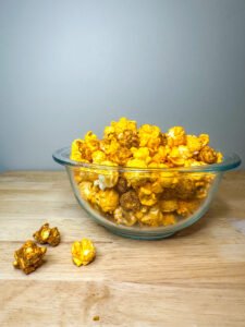 Orange Velvet Crunch bursts with bright citrus flavor, coating crisp popcorn in a dreamy layer of sweet white chocolate. This irresistible blend delivers the perfect balance of zesty, creamy, and crunchy in every bite, making snack time indulgent and unforgettable.