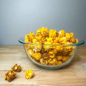Orange Velvet Crunch bursts with bright citrus flavor, coating crisp popcorn in a dreamy layer of sweet white chocolate. This irresistible blend delivers the perfect balance of zesty, creamy, and crunchy in every bite, making snack time indulgent and unforgettable.